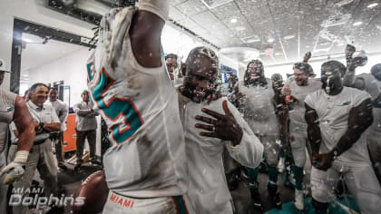 Miami Gardens, Florida, USA. 4th Nov, 2018. Miami Dolphins players storm  onto the field during the opening ceremony of an NFL football game between  the New York Jets and the Miami Dolphins