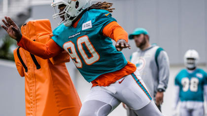 Miami Dolphins defensive tackle Raekwon Davis (98) walks on the