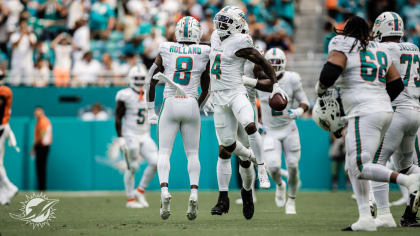 Miami Dolphins safety Jevon Holland, left, and cornerback Jalen