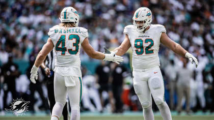 Miami Dolphins defensive tackle Zach Sieler (92) walks back to the