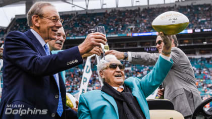 Coach of the Miami Dolphins' perfect season, Don Shula, with quarterback  Bob Griese during a halftime ceremony celebrating the undefeated 1972 team  as the Dolphins play host to the Cincinnati Bengals on