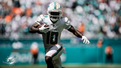 Dolphins report to training camp as WR Tyreek Hill reaches