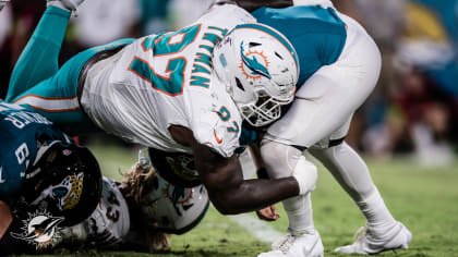 Miami Dolphins running back Jeff Wilson Jr. translates linebacker Andrew  Van Ginkel's INT into Fins TD