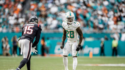 Miami Dolphins cornerback Xavien Howard (25) and cornerback Ethan Bonner  (38) do drills during practice at