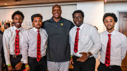 Miami Dolphins alumni Troy Drayton (left) and O.J. McDuffie