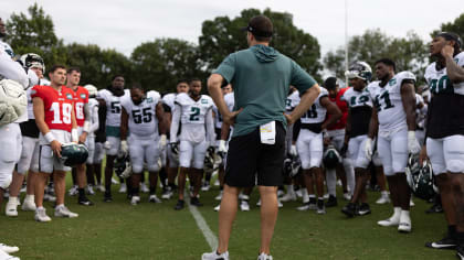 Philadelphia Eagles' Jalen Carter hands his jersey over to a member of the  Military during practice at NFL football training camp, Sunday, July 30,  2023, in Philadelphia. (AP Photo/Chris Szagola Stock Photo 