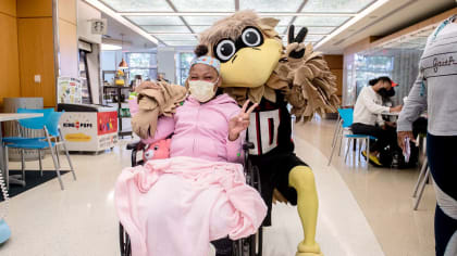 ATLANTA, GA - NOVEMBER 18: Falcons mascot Freddie shoots t-shirts into the  crowd before the Thursday night NFL game between the Atlanta Falcons and  the New England Patriots on November 18, 2021