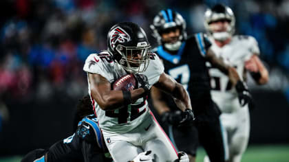 Atlanta Falcons running back Qadree Ollison (32) celebrates his 9-yard  touchdown run against the Jacksonville Jaguars with offensive tackle Kaleb  McGary (76) during the first half of an NFL preseason football game