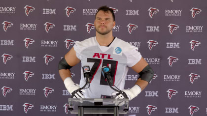 Atlanta Falcons center Matt Hennessy (61) works during the first