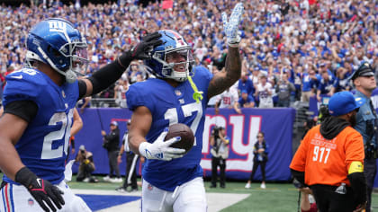 New York Giants safety Dane Belton (24) and linebacker Tomon Fox