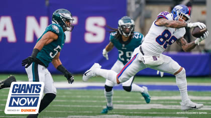 The Philadelphia Eagles' Nick Foles (9) congratulates Michael Vick (7)  after a touchdown drive against the Carolina Panthers during the second  quarter in preseason action at Lincoln Financial Field in Philadelphia,  Pennsylvania