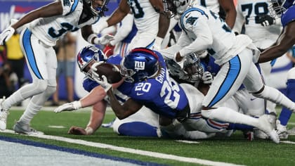 Tomon Fox chases down Matt Corral for Giants sack