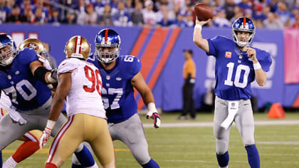 Eli Manning tosses four touchdown passes in win over Eagles