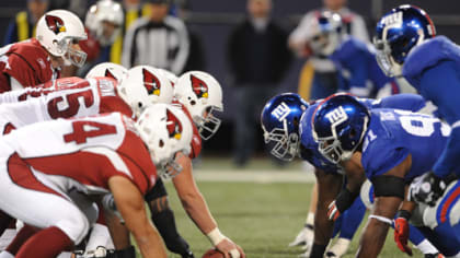 Arizona Cardinals Brandon Keith looks up at the scoreboard in the