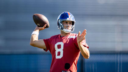 Rams' running back John Cappelletti, the former Heisman winner, is dragged  down by a shirt tackle as he tried to circle the New York Giants' left side  in Los Angeles Sunday, Sept.