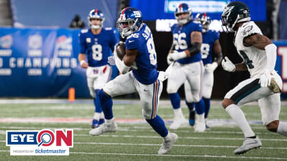 New York Giants Trumaine McBride leaps and reaches for the football as  Philadelphia Eagles DeSean Jackson catches a 56 yard reception in the  second quarter in week 5 of the NFL season