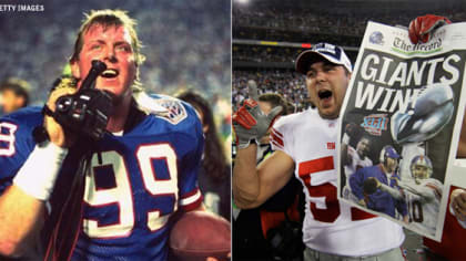 New York Giants line backer Zak DeOssie holds up a newspaper proclaiming  the Giants' win over the New England Patriots at Super Bowl XLII at  University of Phoenix Stadium in Glendale, Arizona