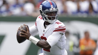 Tyrod Taylor of the New York Giants runs with the ball against the