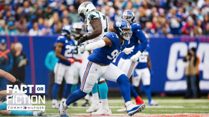 Carolina Panthers Charles Godfrey watches New York Giants Steve