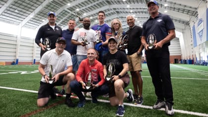 Eli Manning and Daniel Jones help with Girls Flag Football clinic