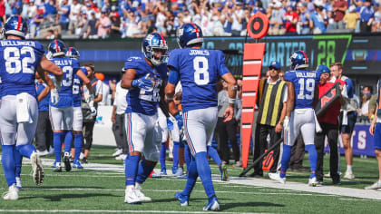 Carolina Panthers' Jeremy Chinn, left, tries unsuccessfully to stop New  York Giants' Daniel Bellinger from scoring a touchdown during the second  half an NFL football game, Sunday, Sept. 18, 2022, in East