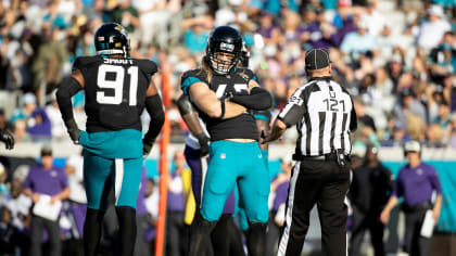 Jacksonville Jaguars safety Andrew Wingard (42) tackles Tennessee