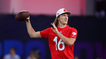 AFC quarterback Trevor Lawrence (16) of the Jacksonville Jaguars stands  alongside coach Peyton Manning during the flag football event at the NFL  Pro Bowl, Sunday, Feb. 5, 2023, in Las Vegas. (AP