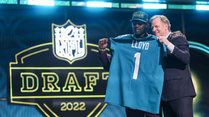 Utah Utes Devin Lloyd bear hugs Roger Goodell at NFL Draft