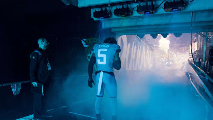 Tennessee Titans guard Jordan Roos (70) takes his helmet off during a time  out of an NFL football game against the Jacksonville Jaguars, Saturday,  Jan. 7, 2023, in Jacksonville, Fla. The Jaguars