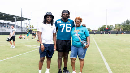 Jacksonville Jaguars offensive tackle Anton Harrison (76) puts on