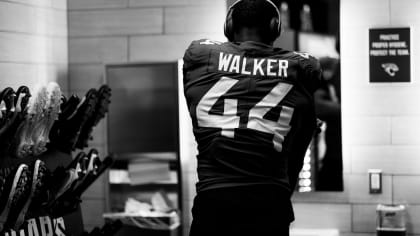 Jacksonville Jaguars vs. Cleveland Browns. NFL Game. American Football  League match. Silhouette of professional player celebrate touch down.  Screen in background. Stock Photo