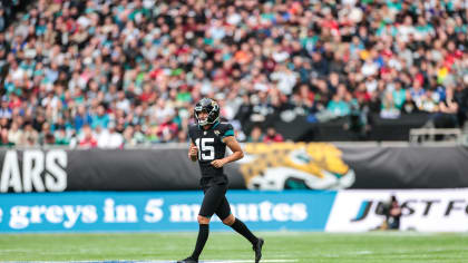 Jacksonville Jaguars kicker Matthew Wright (15) celebrates with quarterback Trevor  Lawrence (16) after victory against the Miami Dolphins in the NFL  International Series game at Tottenham Hotspur Stadium, Sunday, Oct. 17,  2021