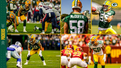 Green Bay Packers linebacker Isaiah McDuffie (58) picks up a loose ball  during an NFL football game against the Washington Commanders, Sunday, October  23, 2022 in Landover. (AP Photo/Daniel Kucin Jr Stock