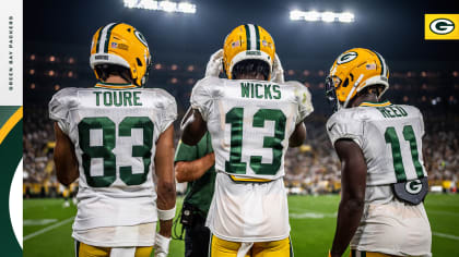 Packers players Josiah Deguara, Innis Gaines & Samori Toure