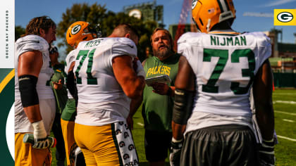 Green Bay Packers guard Zach Tom (50) lines up during an NFL