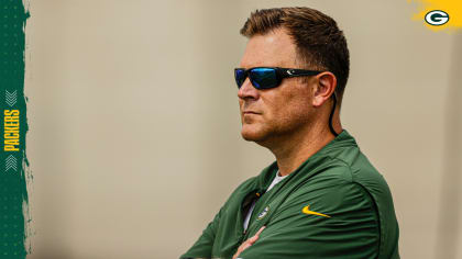 MIAMI GARDENS, FL - DECEMBER 25: Green Bay Packers safety Innis Gaines (38)  directs teammates as he