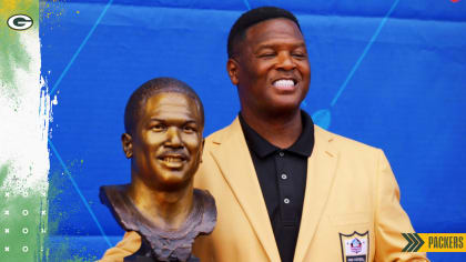 LeRoy Butler poses with Hall of Fame bust