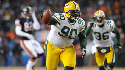 Green Bay Packers defensive tackle B.J. Raji blows kisses to fans