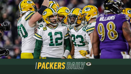 BALTIMORE, MD - DECEMBER 19: Packers running back A.J. Dillon (28) runs the  ball during the Green Bay Packers versus Baltimore Ravens NFL game at M&T  Bank Stadium on December 19, 2021