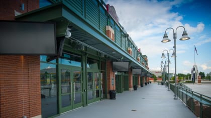 Football fans enjoy the new Johnsonville Tailgate Village