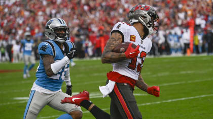 Tom Brady, Bucs rally to beat Panthers 30-24, clinch NFC South