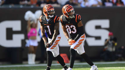 Cincinnati Bengals linebacker Logan Wilson (55) runs for the play during an  NFL wild-card football game against the Baltimore Ravens on Sunday, Jan.  15, 2023, in Cincinnati. (AP Photo/Emilee Chinn Stock Photo 