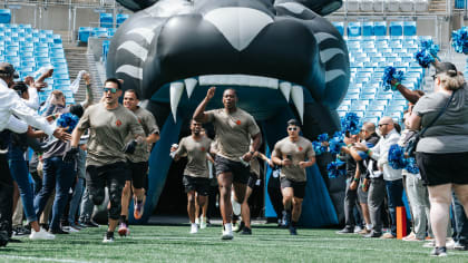 Derrick Brown talks to Thomas Davis about Walter Payton Man of the Year  award