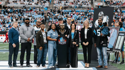 Melanie Mills, widow of former NFL player Sam Mills, waves to the crowd as  the Carolina Panthers honored Sam Mills during an NFL football game between  the Carolina Panthers and the Arizona