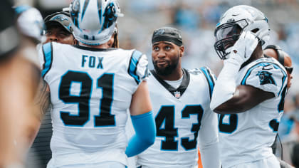 Carolina Panthers defensive end Morgan Fox (91) runs off the field