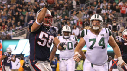 New York Jets Tim Tebow meets San Diego Chargers Phillip Rivers on the  field after the game in week 16 of the NFL season at MetLife Stadium in  East Rutherford, New Jersey