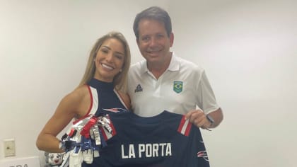 Brazilian Patriots Cheerleader Lara recently visited Brazil to spread some  Patriots cheer