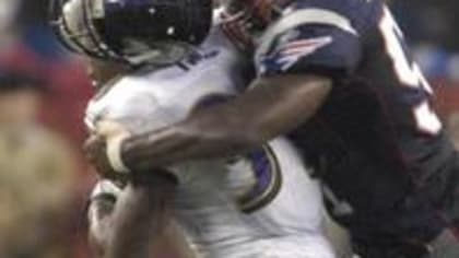 Baltimore Ravens Ray Lewis (52) sticks out his tongue during an