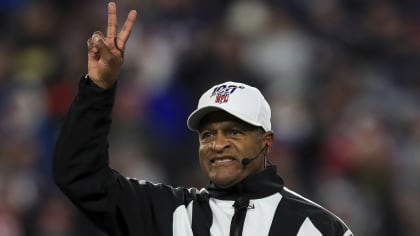 Referee Jerome Boger wears a Crucial Catch hat during an NFL football game  between the Carolina