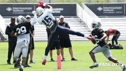 Raiders safety Trevon Moehrig (25) adjusts his head wrap during their NFL  training camp practic …